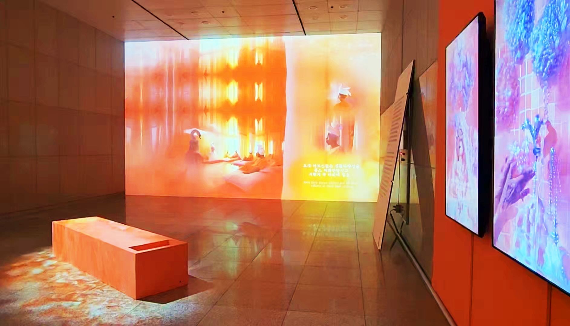 Installation image from Inhwa Yeom’s SAUNA LAB: Flowers of Hot Spring, a multi-channel video installation